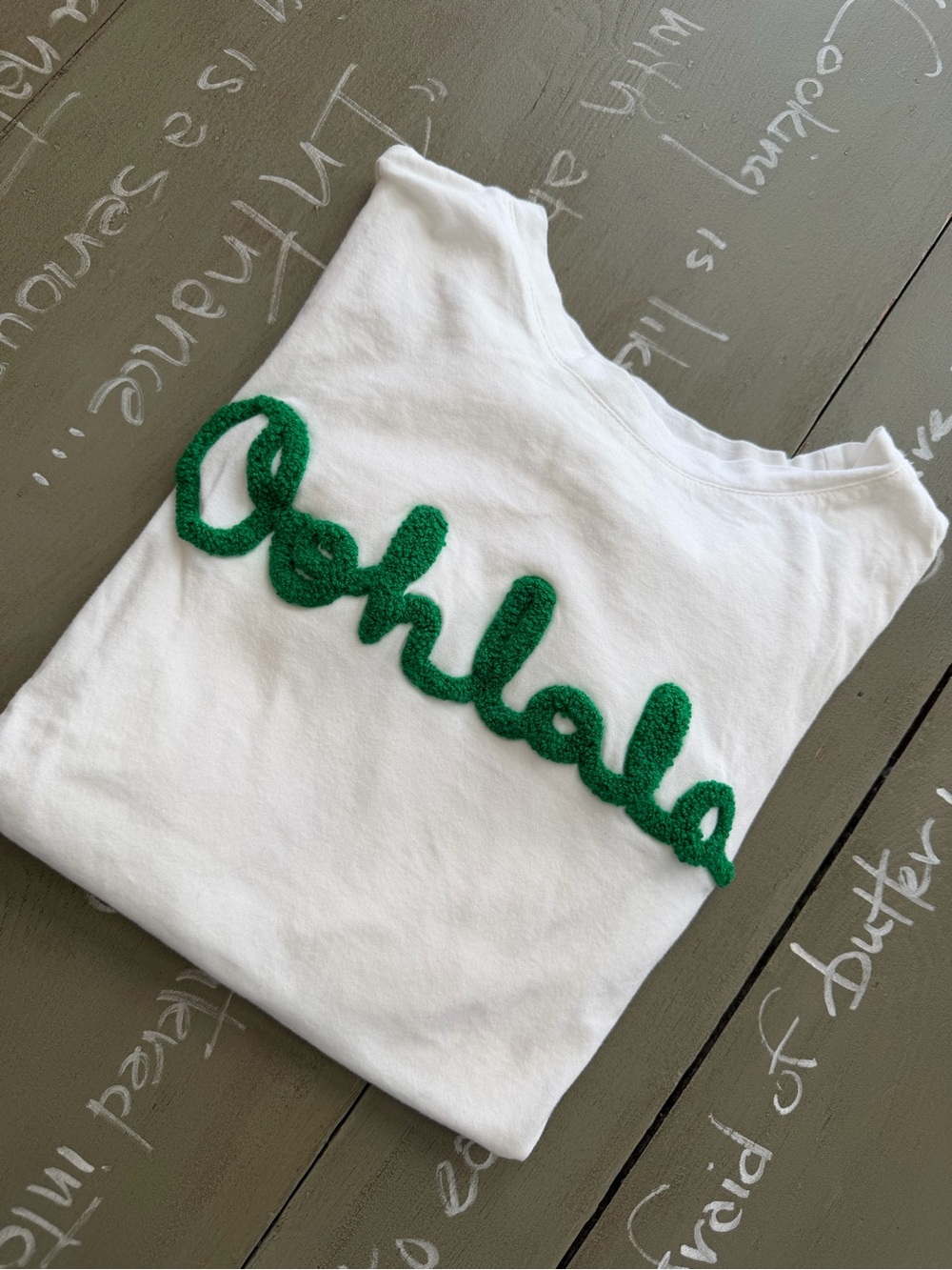 White Tee with Green 'Oohlala' Appliqué
